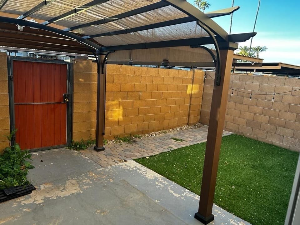 Backyard leads to covered parking 