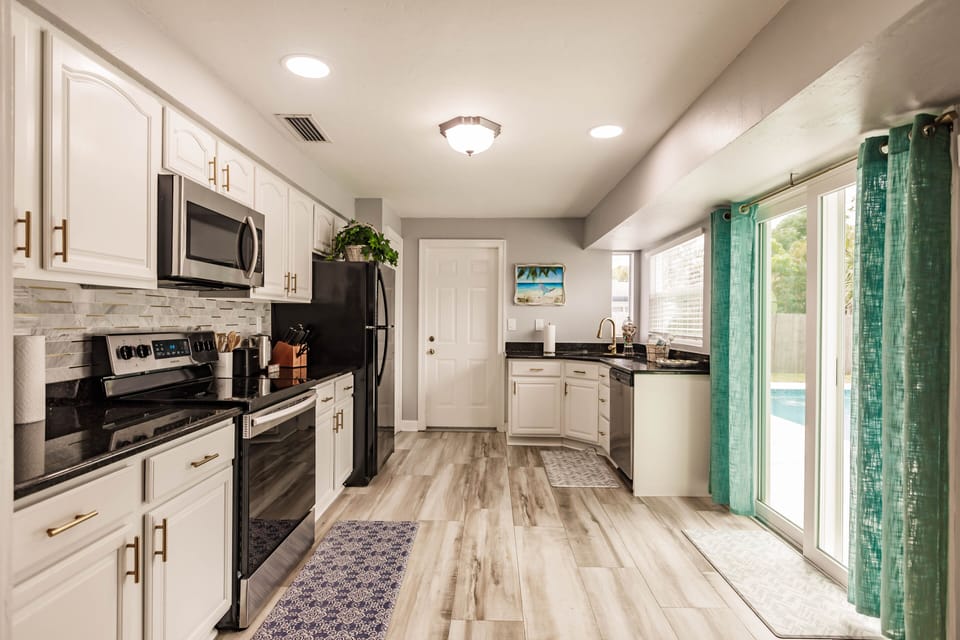 Kitchen with pool area access