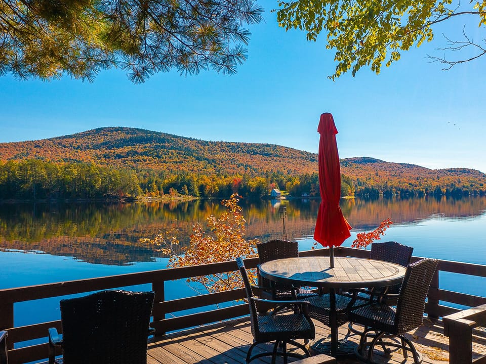Beautiful lakefront deck along private lake frontage with boat dock