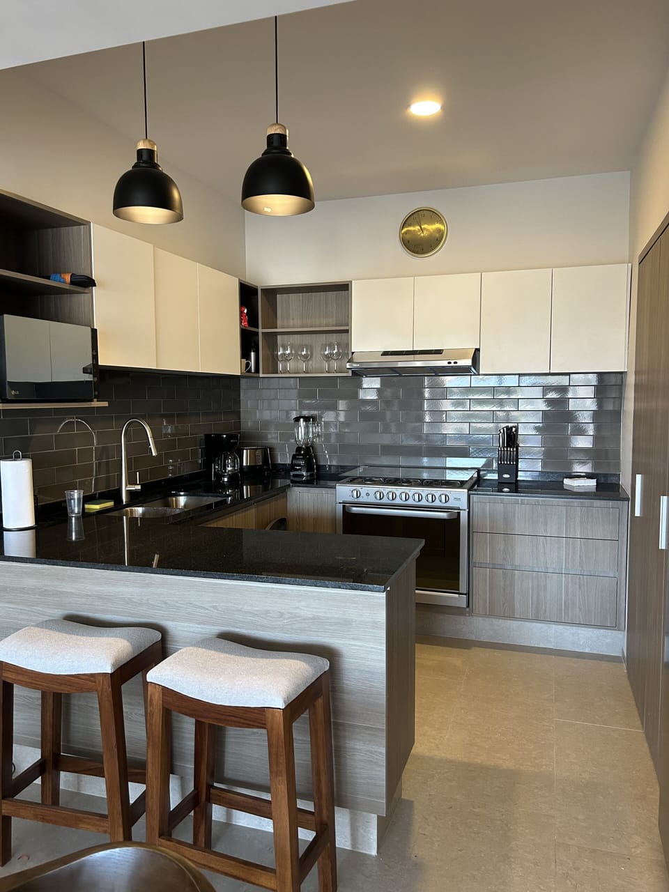 Kitchen with state of the art appliances including a 6 burner stove.