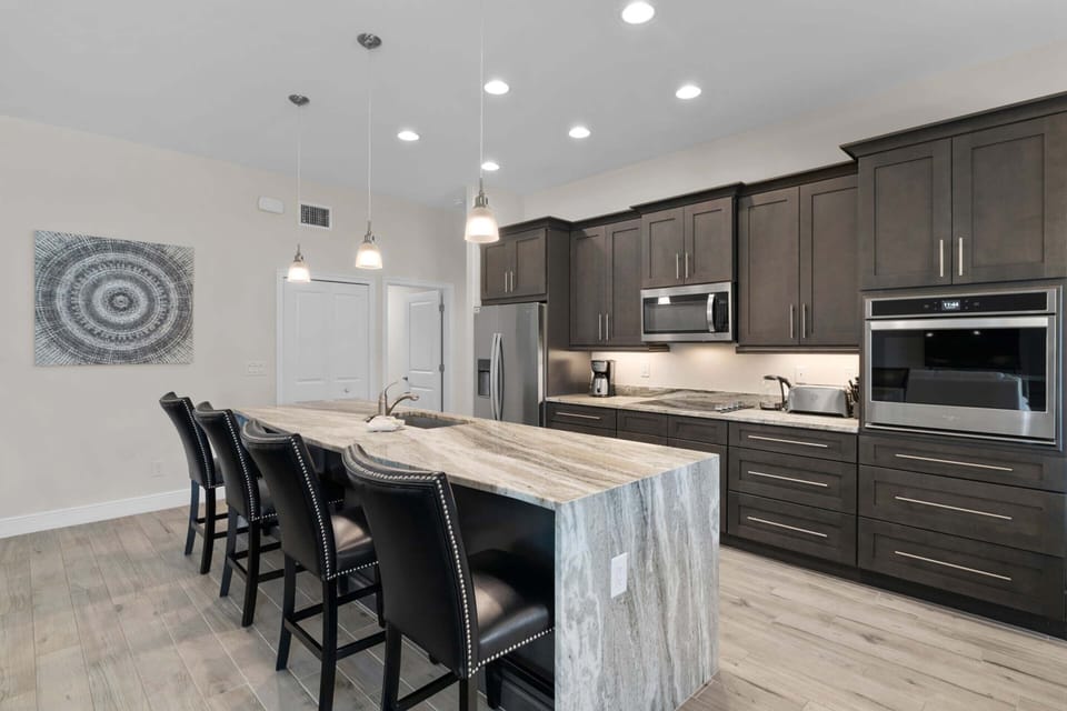 Fully Equipped Kitchen with Stainless Steel Appliances