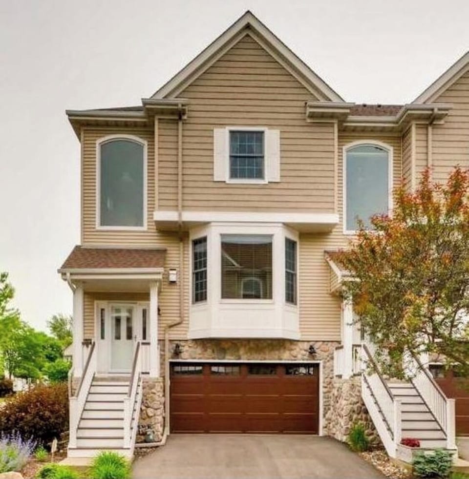 End unit with two driveway parking spots 