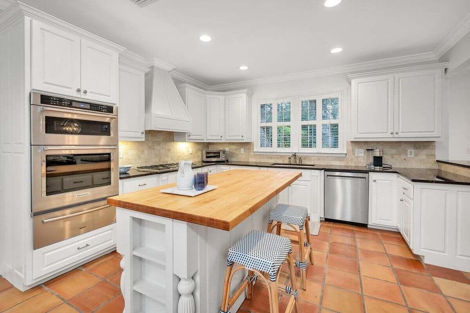 Alternate view of open-concept kitchen with island seating