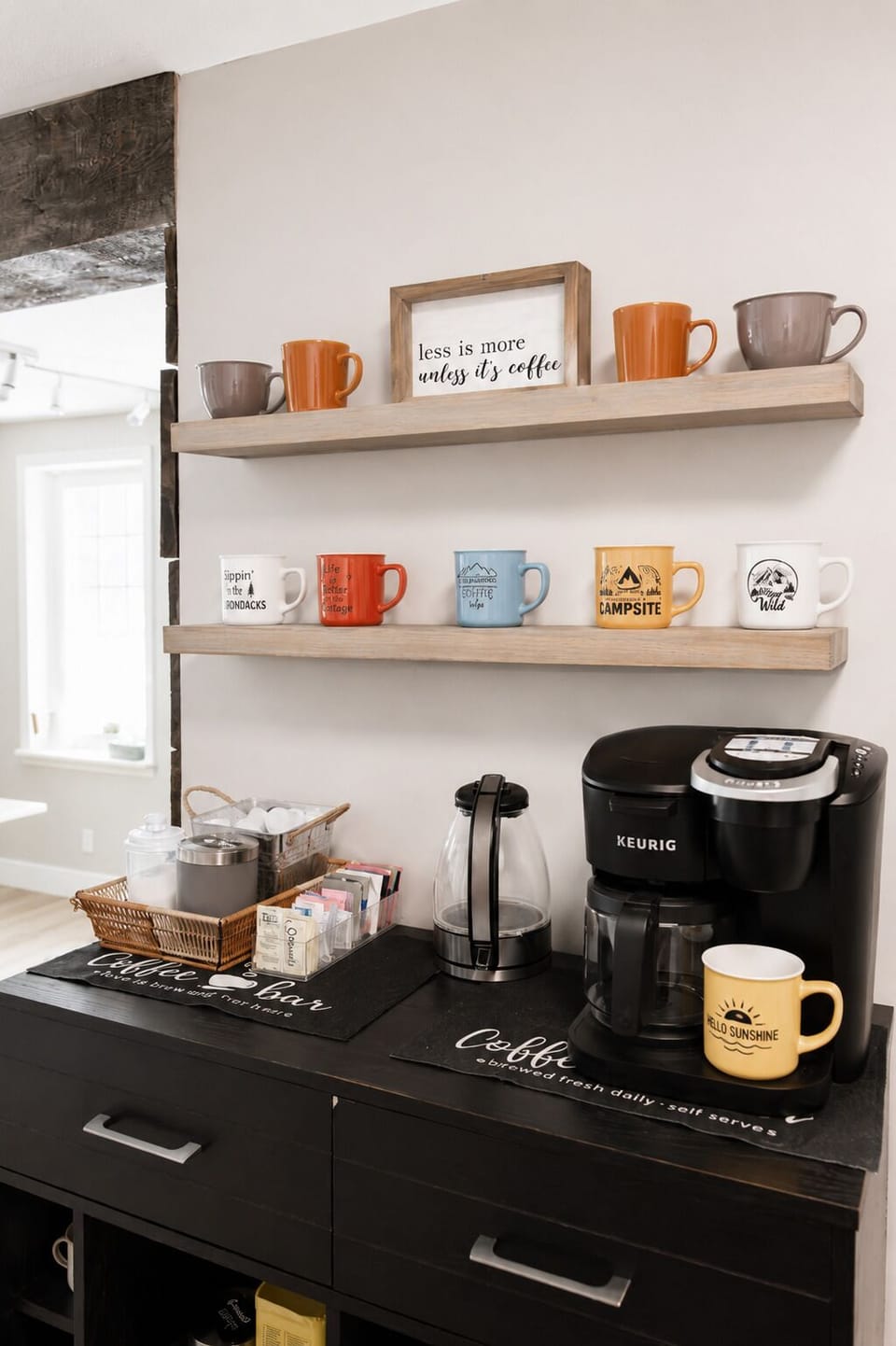 Start your mornings your way with a coffee corner stocked with K-cups, ground coffee, tea bags, and sugar.