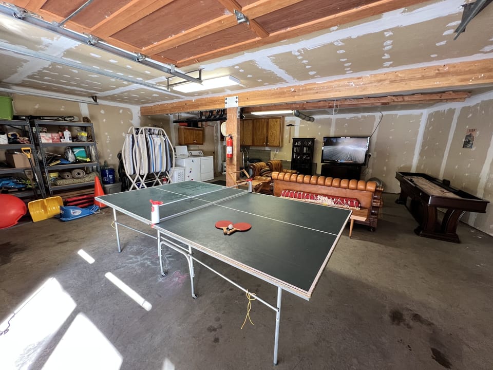 Game room and laundry inside the garage. Access from outside only.