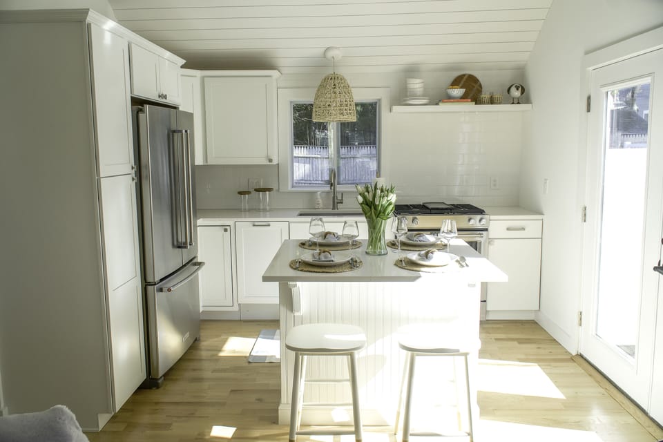 Kitchen & Island. 2 stools out, 2 stools in the closet for added seating. 