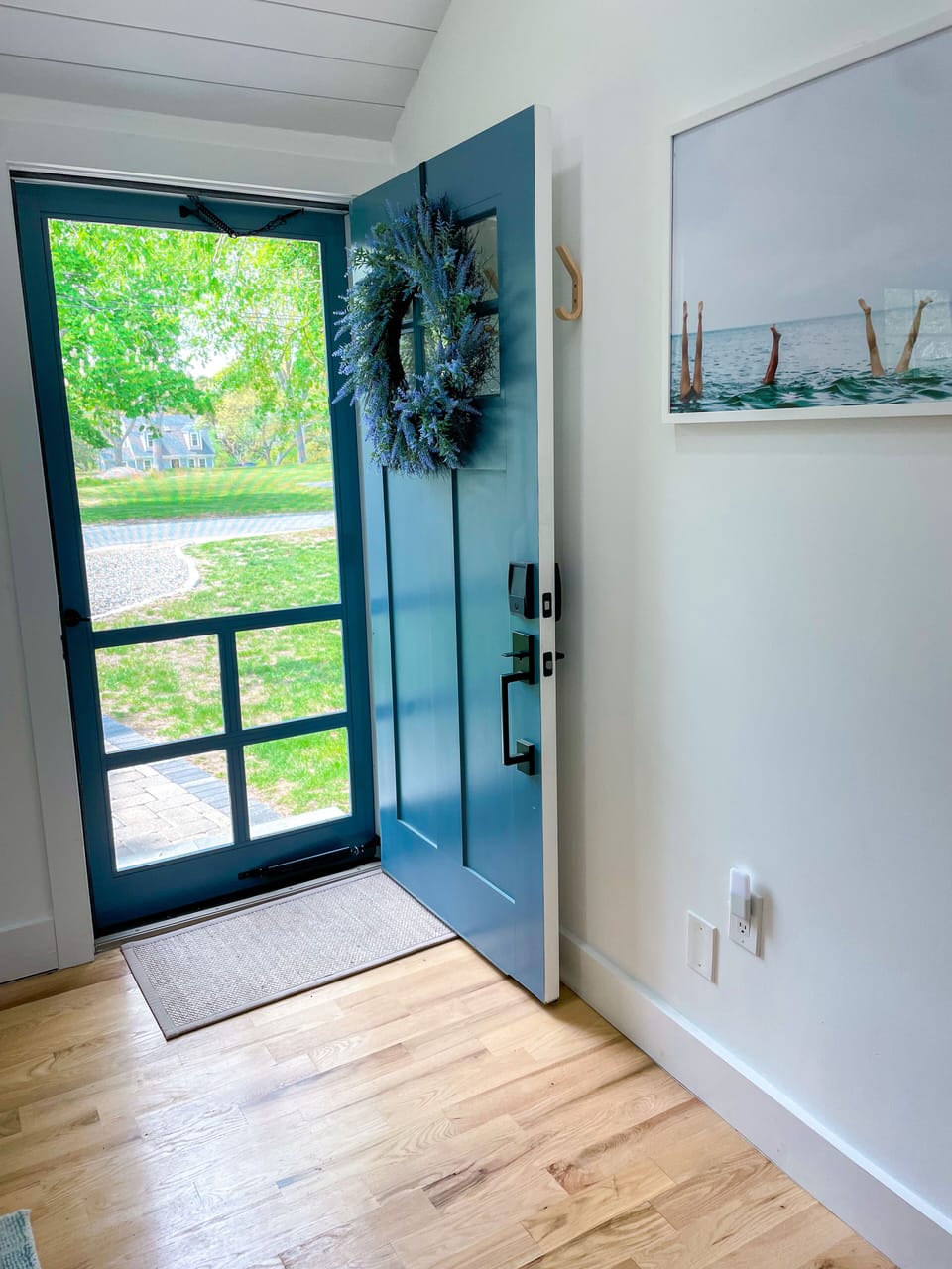 New screen door perfect for a summer breeze, more light & neighborhood watching