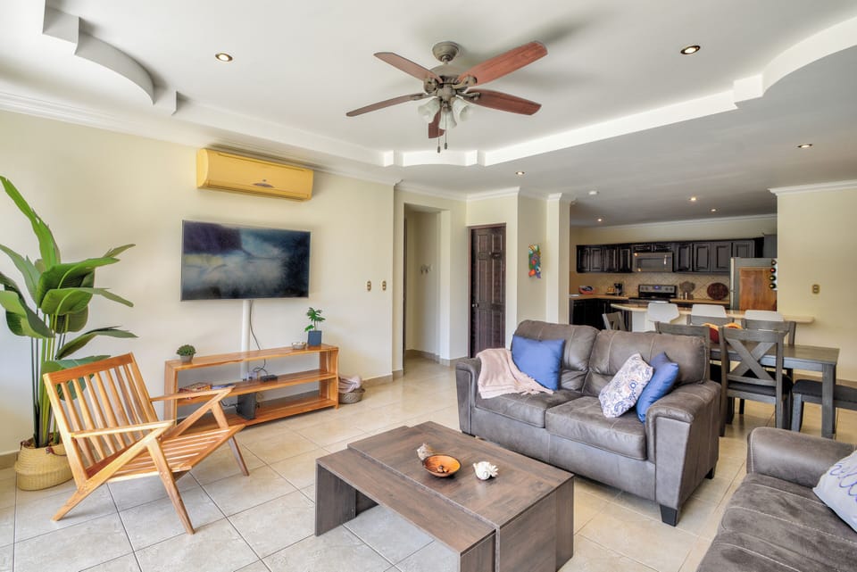 Open living & kitchen area view from pool patio doors.