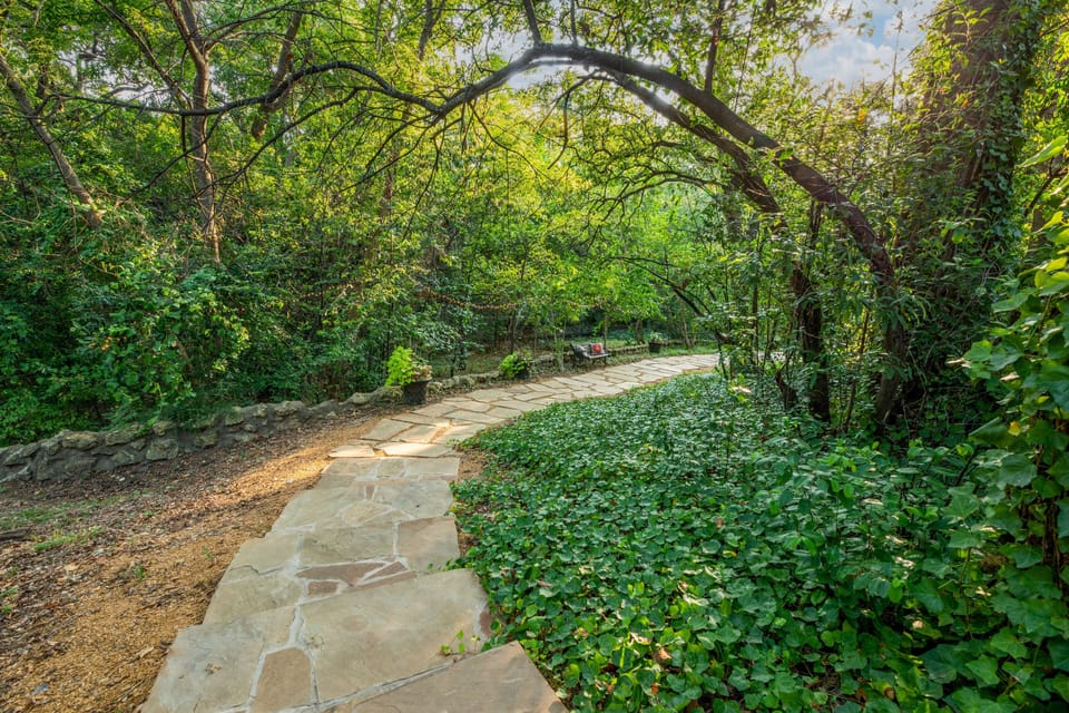 Enjoy walkways-2 acres of beautiful wooded grounds