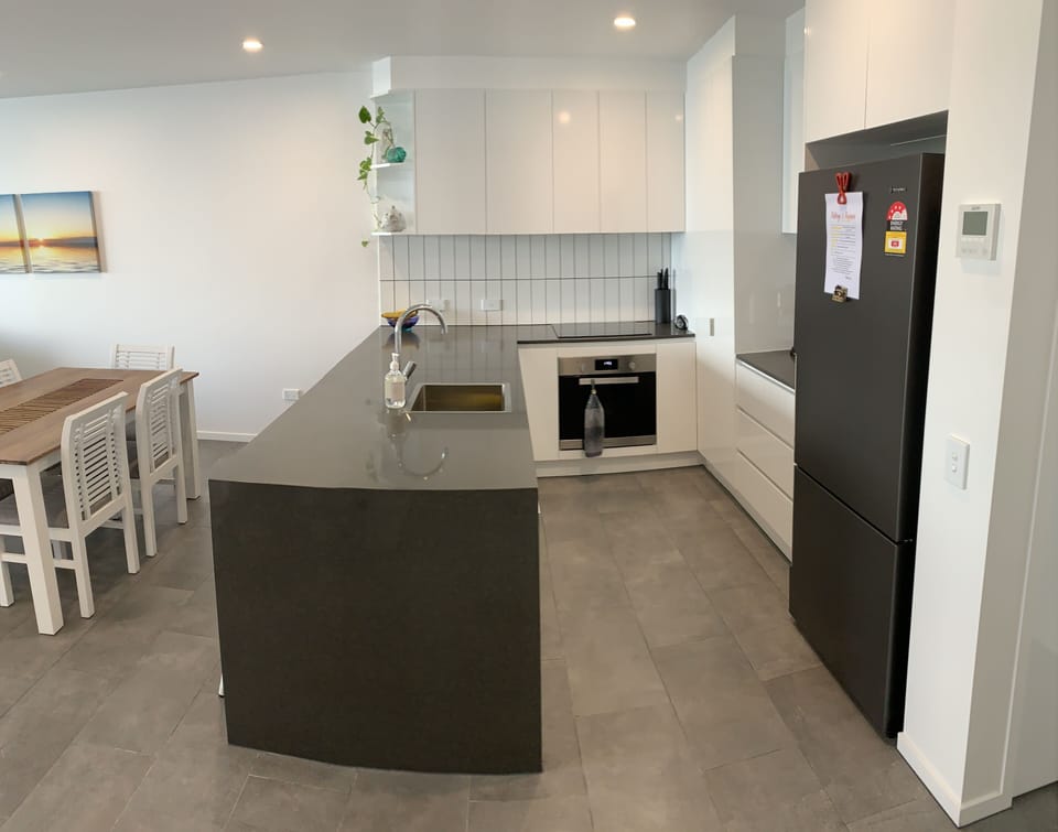Spacious full kitchen with all amenities. Cook and look out to the serene water.