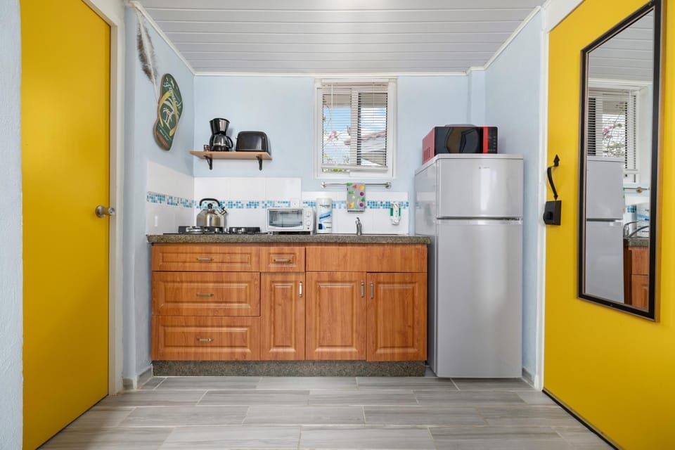 The well-equipped kitchenette allows you to eat in.  Dishes, pots, pans, cutlery, a coffee maker, a microwave and a toaster oven are provided.