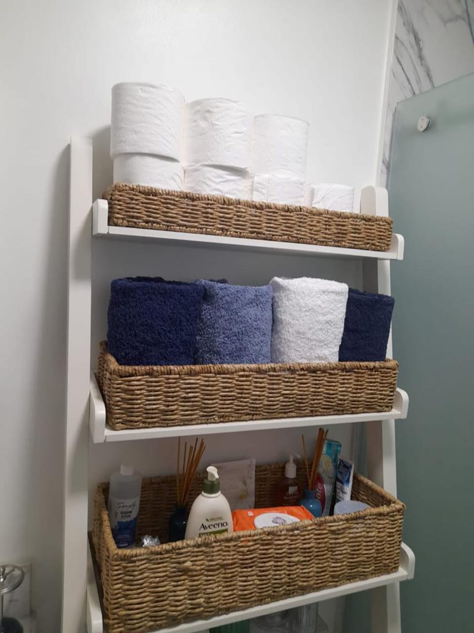 Storage ladder in bathroom (for extra toiletries, towels, lotion, etc.)