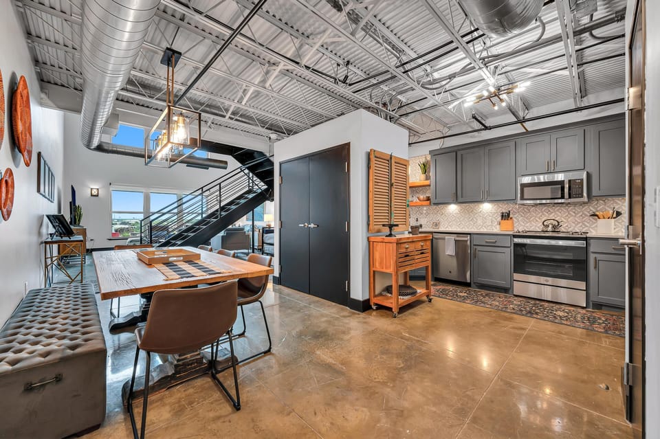 Kitchen and dining area looking into living.