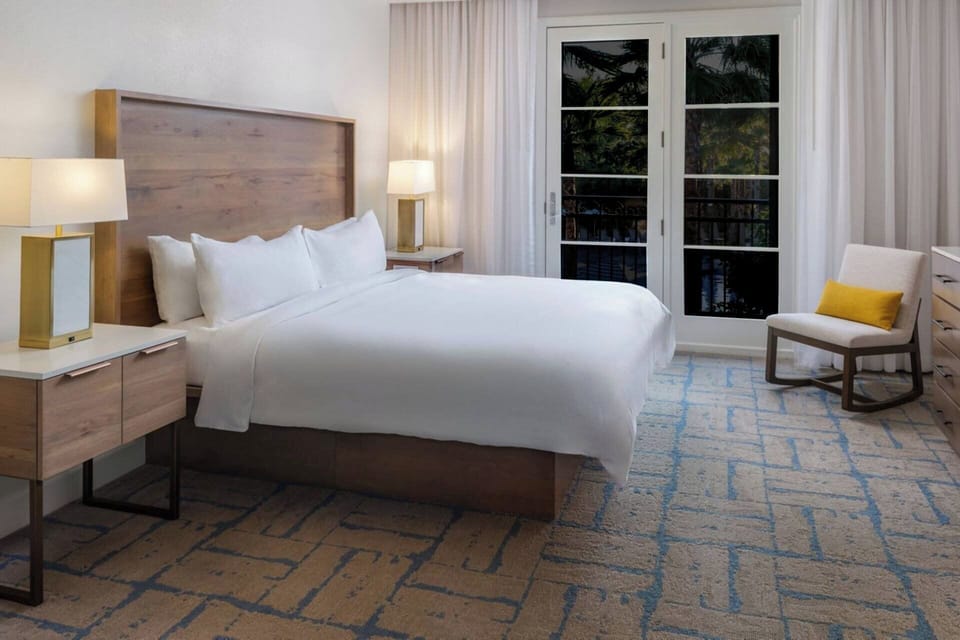 Primary Bedroom features a king bed and ensuite bath