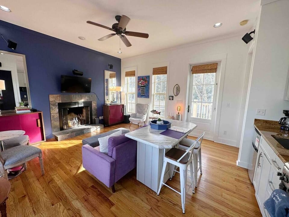 The living room is perfect for enjoying a quiet evening or chatting with loved ones in comfort.