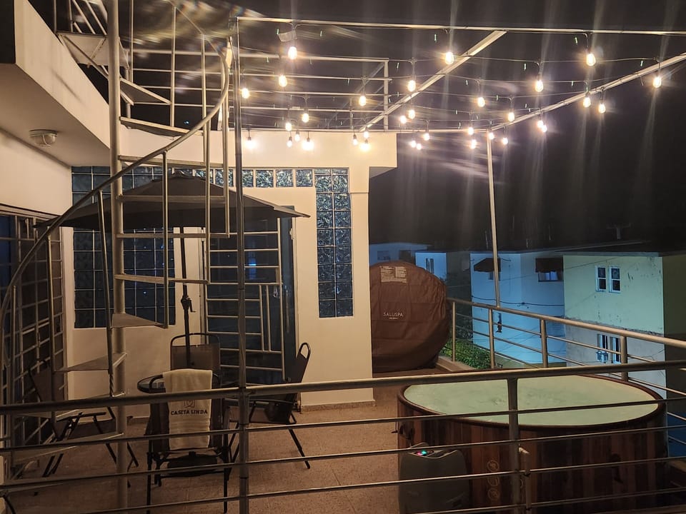Terrace with private Jacuzzi and outdoor furniture
