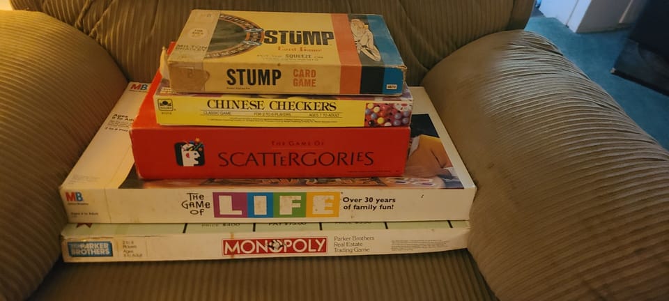 You'll find an assortment of games in the dresser in the living room, and cards