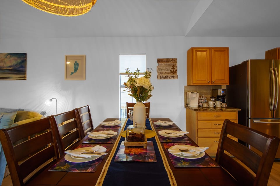 This dining area can seat up to 9! with a bench, and 6 chairs!