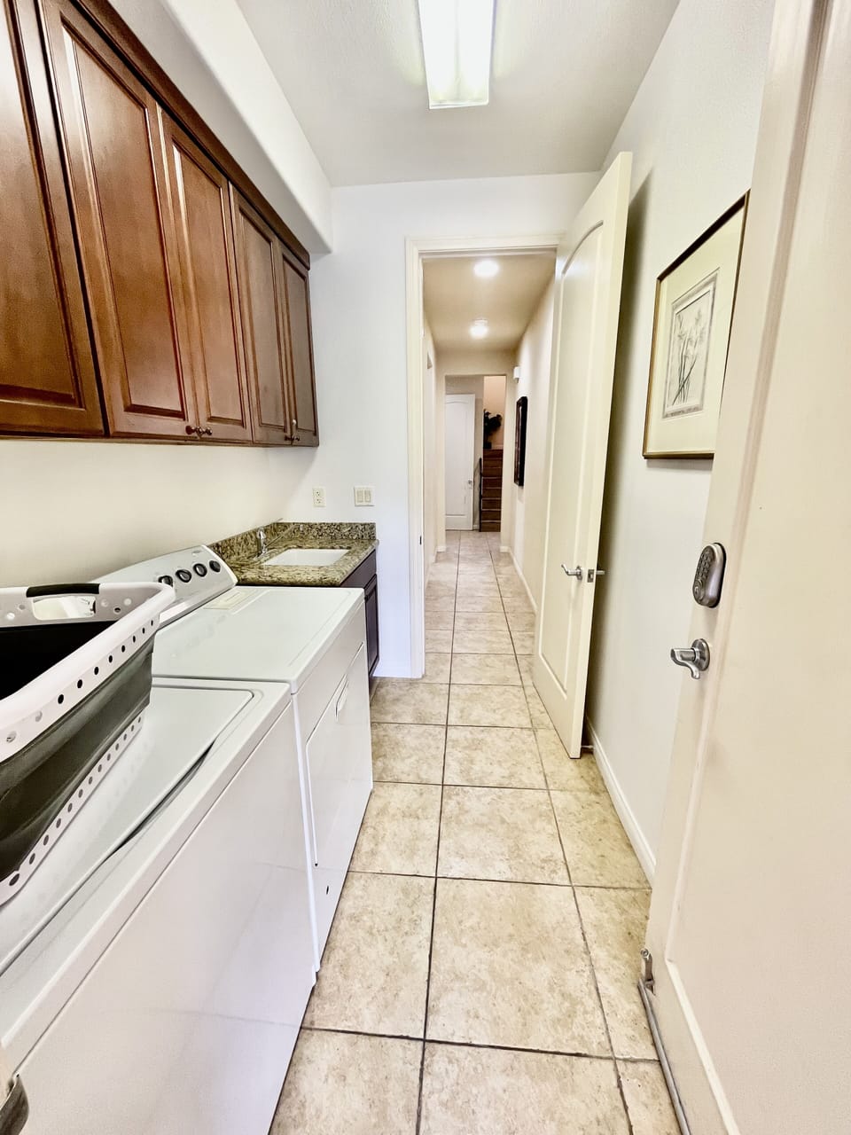 Laundry room off 2 car garage 