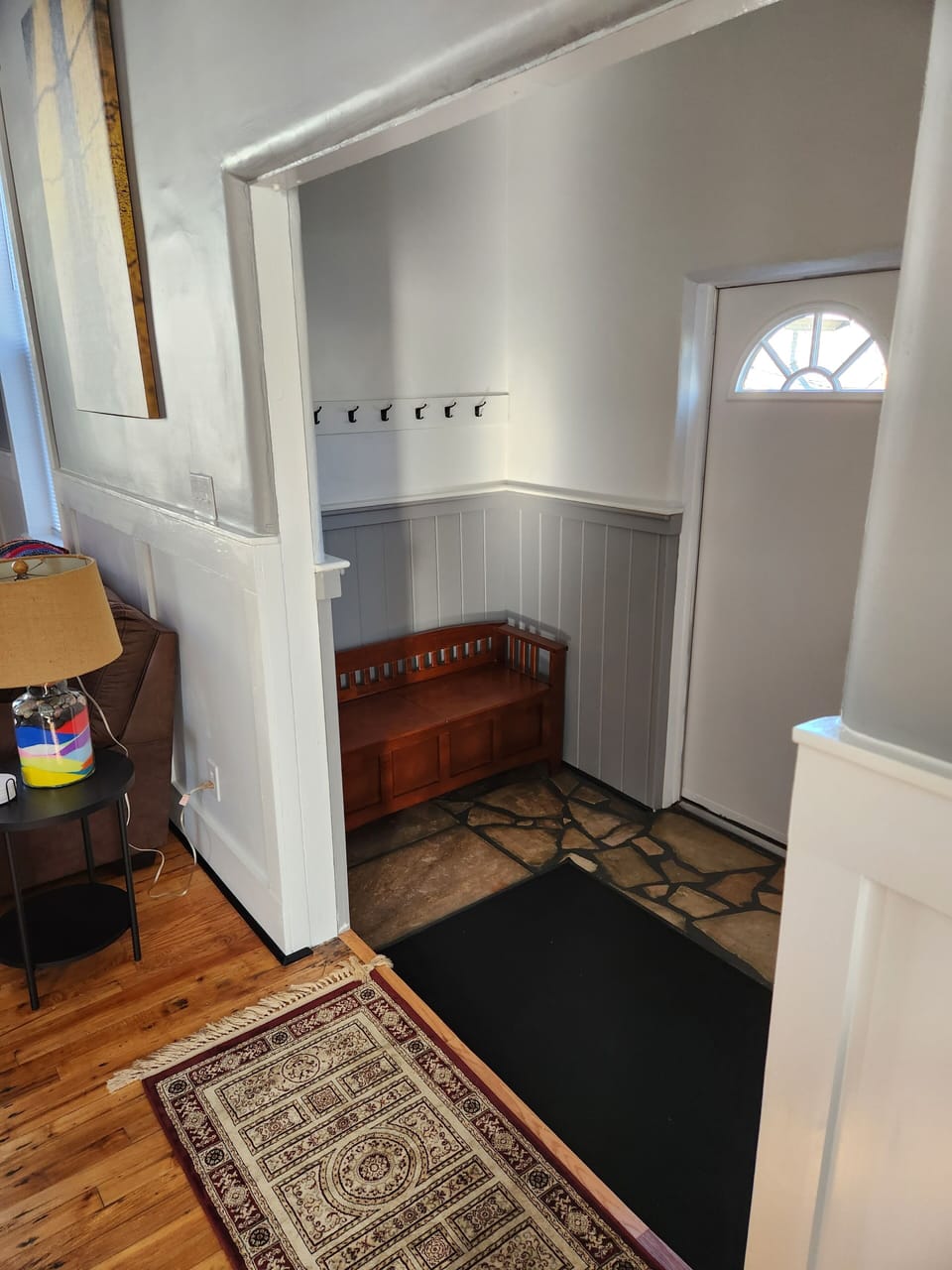 Entry way has bench and plenty of coat hooks. Also a coat closet.