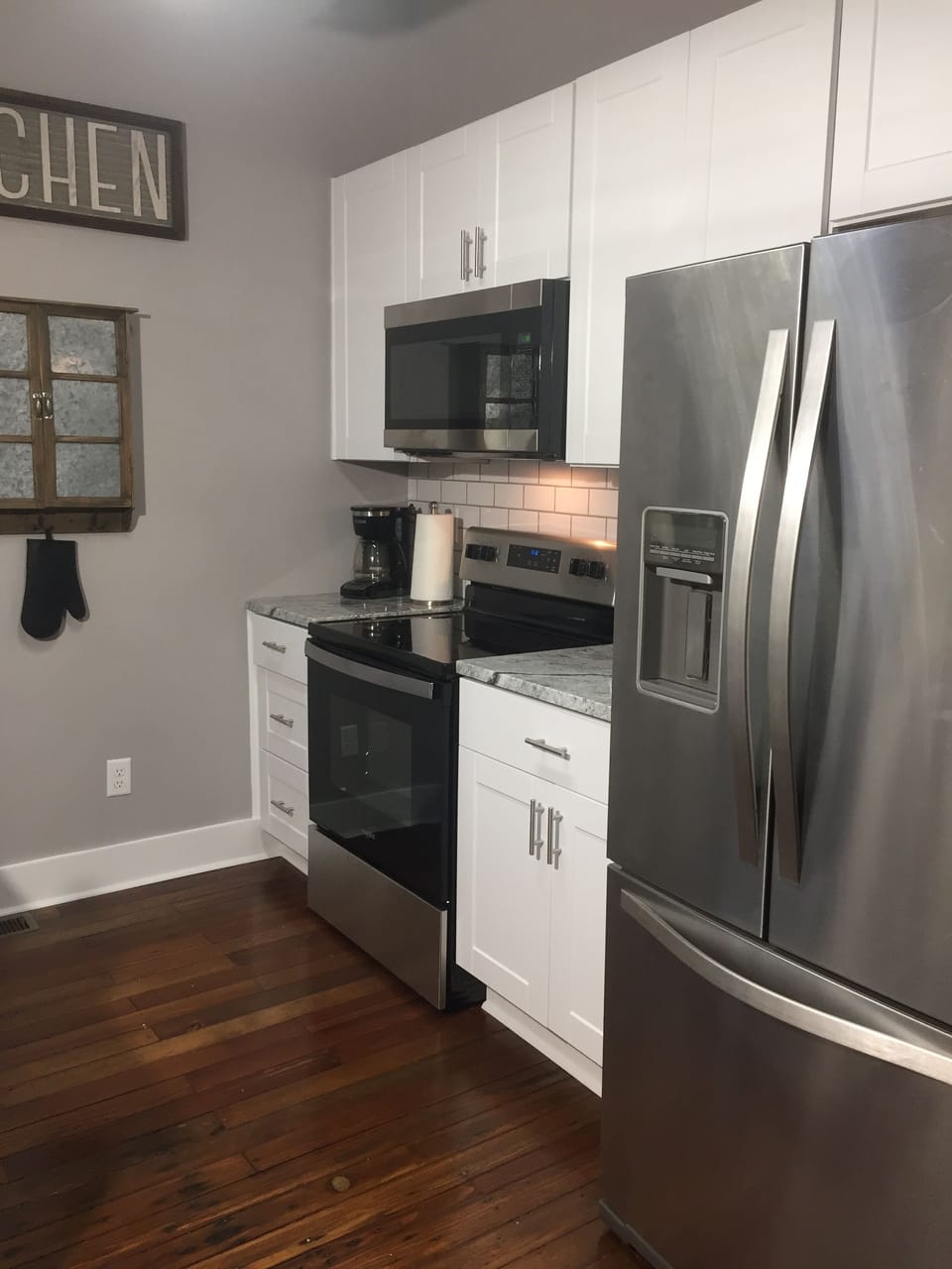 Full kitchens have stainless steel appliances, a microwave and dishwasher. 