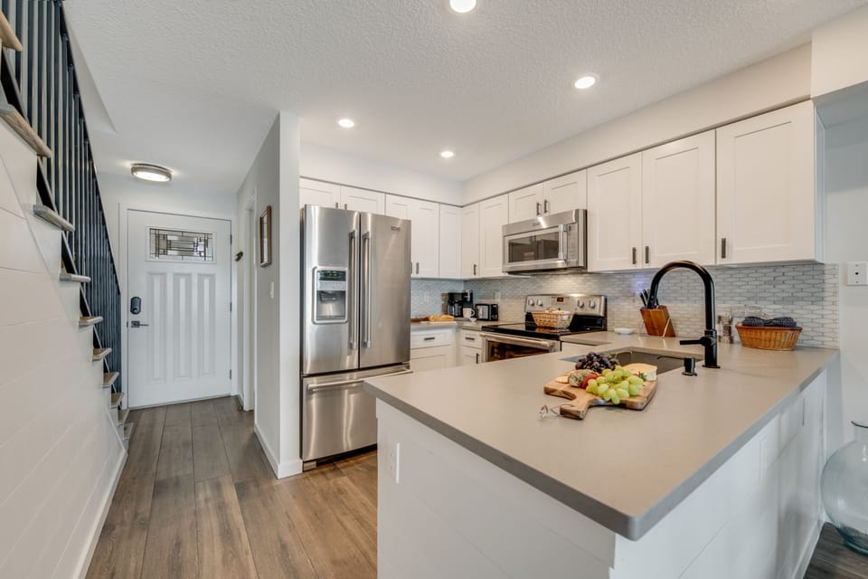 A beautiful stocked kitchen just waiting for you to bring in your groceries 