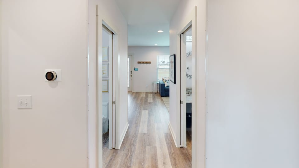 This hall leads to the 3 bedrooms and the 2.5 bathrooms