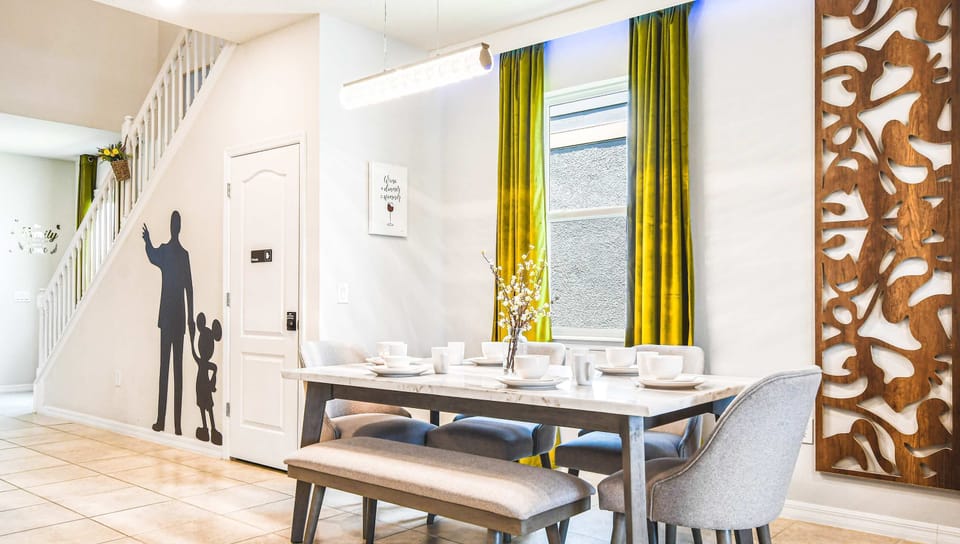 Chic dining space with whimsical decor, perfect for family meals and magical moments!