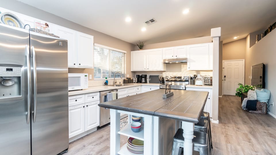 Spacious kitchen with large eat in island
