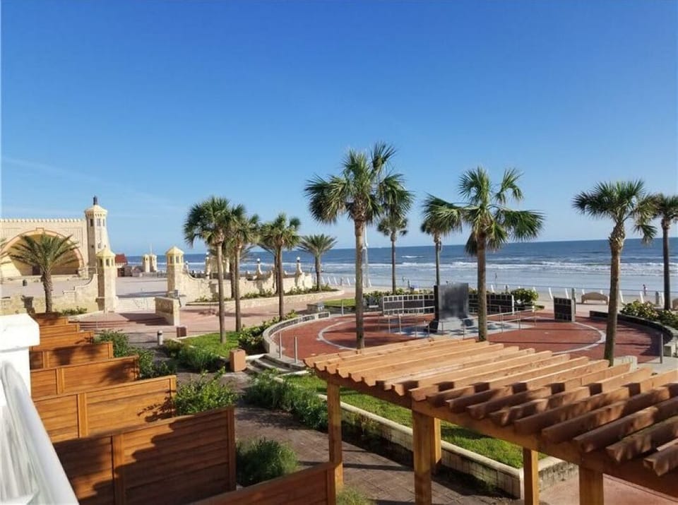 Wake up steps from the shore with sweeping coastal views.