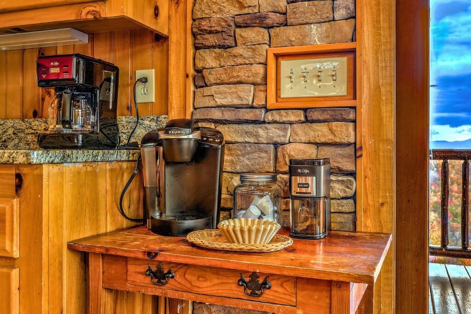 Charming coffee bar with Keurig, drip maker, and rustic vibes for cozy mornings!