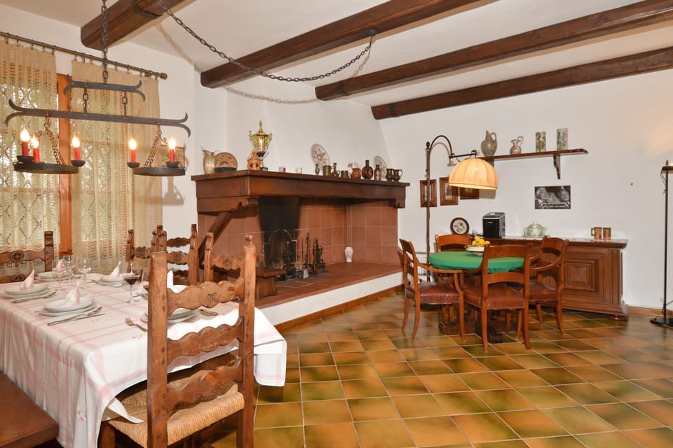 The dining area close to the fireplace