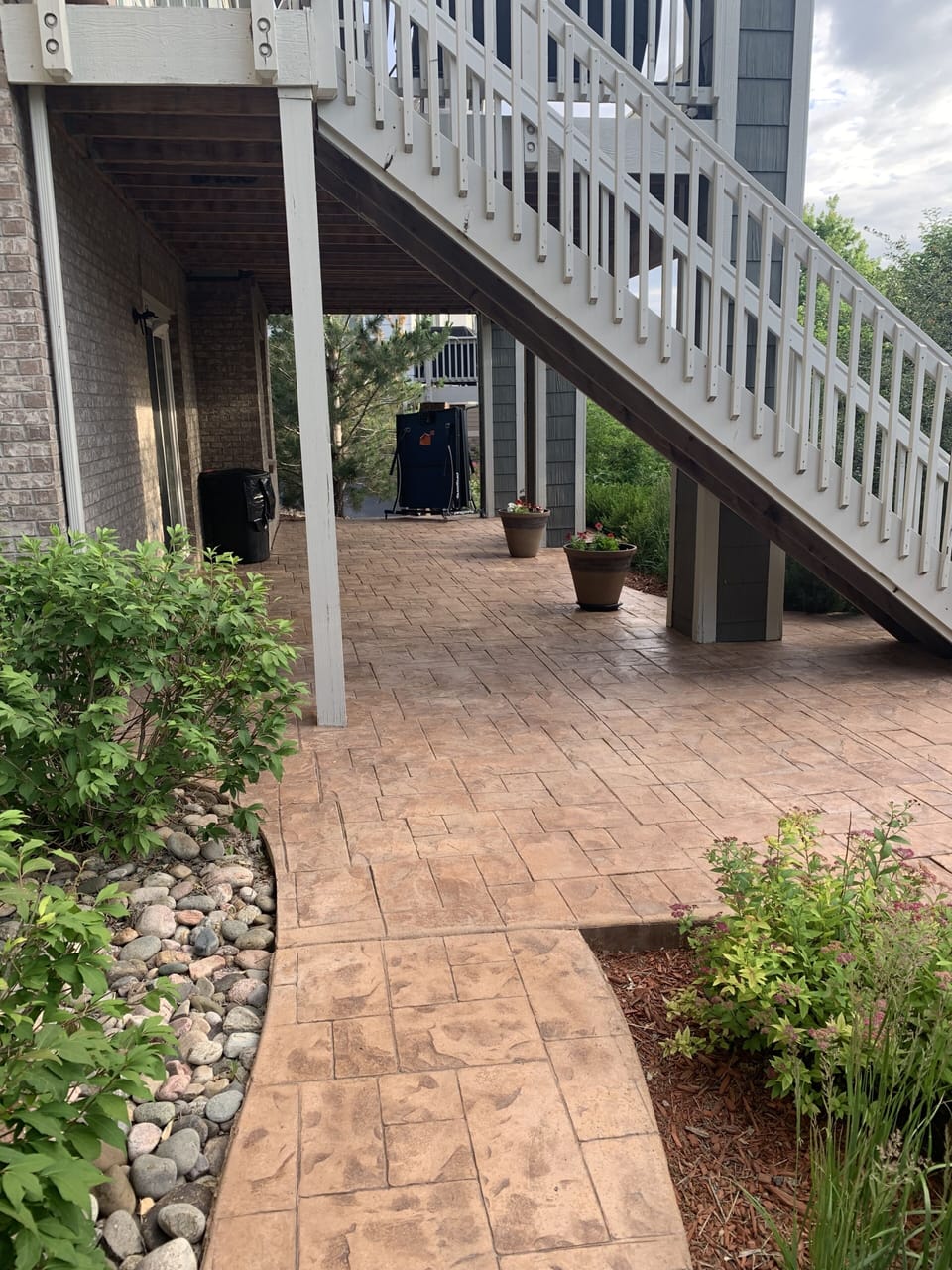 front of the basement entrance where guests enter