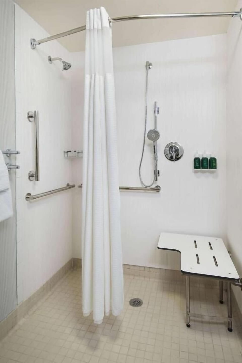 Enjoy an accessible roll-in shower designed for added comfort.