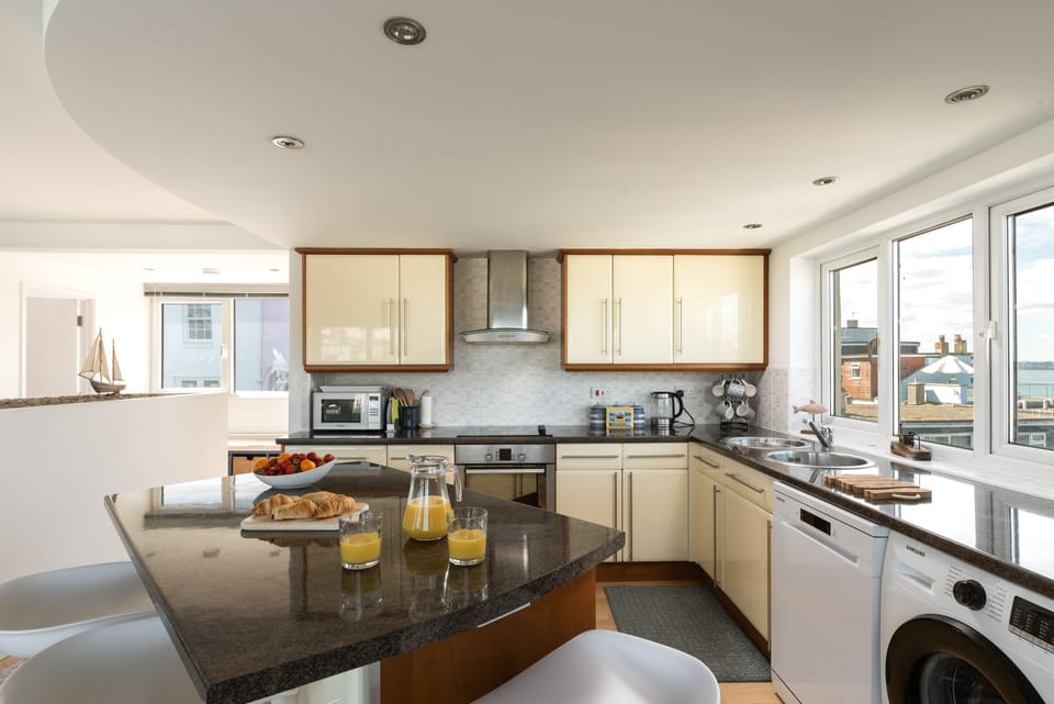 Pull up a stool and have a chat around the kitchen island