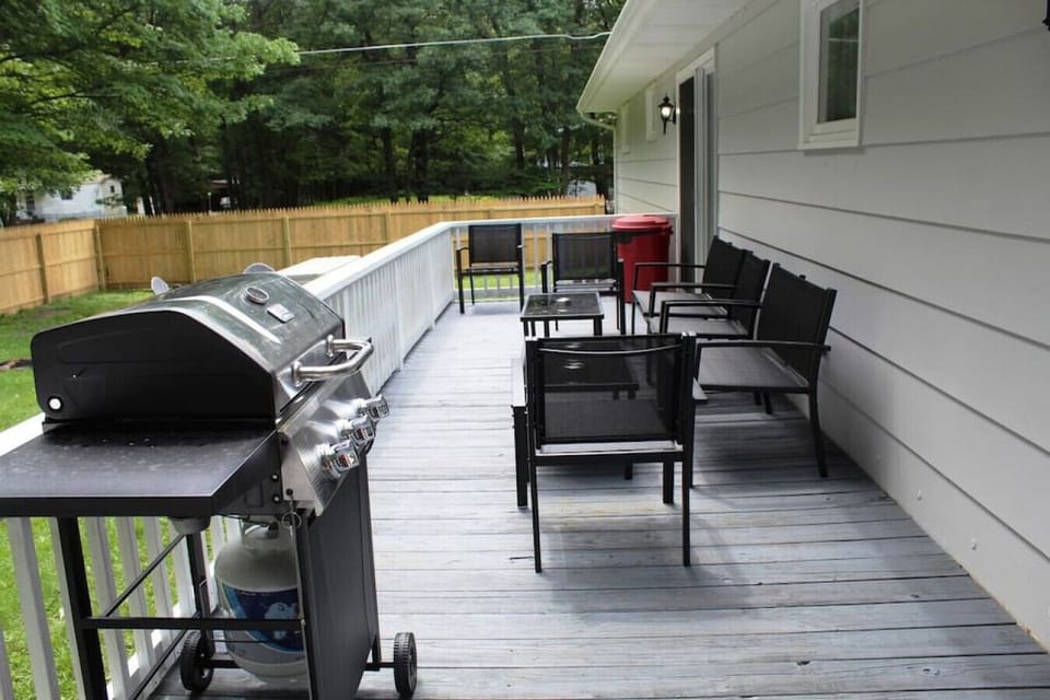 Fire up the grill and gather on the rear patio for a perfect BBQ.