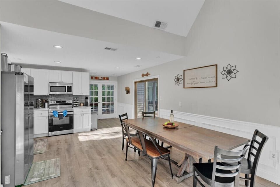 Spacious dining space designed for comfort and togetherness.