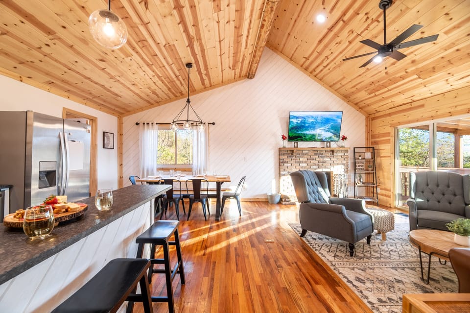 Living room area with tons of natural light.
