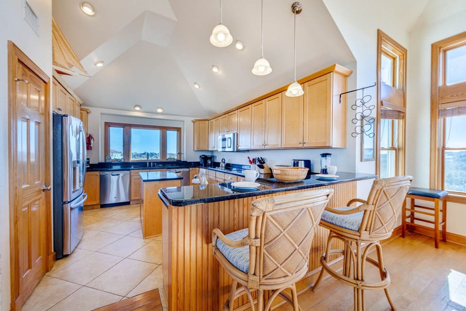Keep the chef company at the breakfast bar.