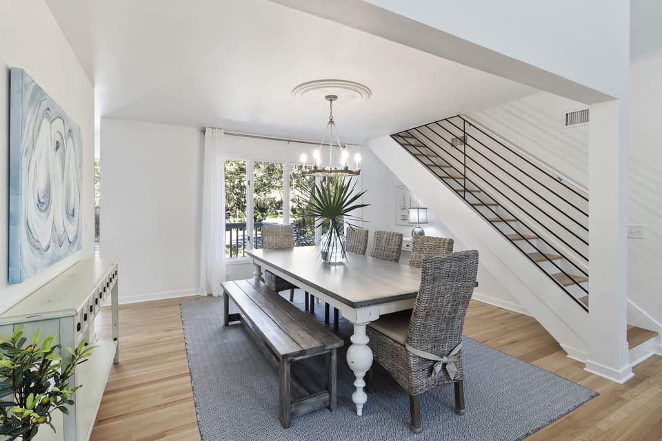 Main Dining Room- Seats 8 Guests - Staircase leads to Bedroom 4 -Bunk Beds