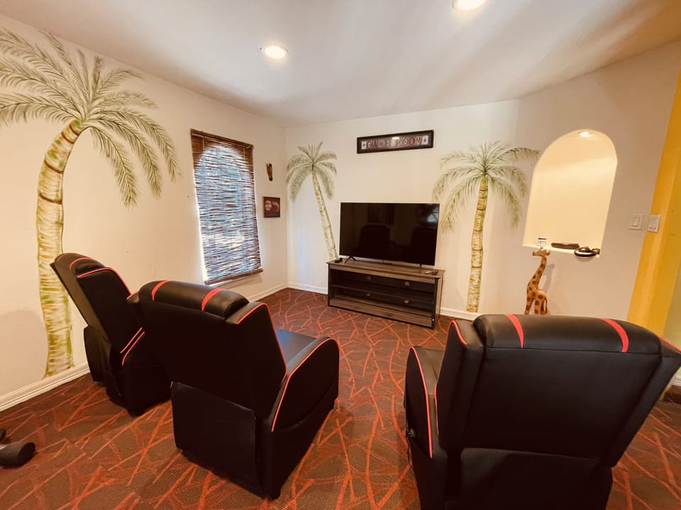 gaming area with reclining seats and smart tv , no gaming consoles provided 