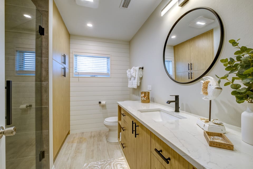 Luxurious bathroom with accent shower and vanity lights