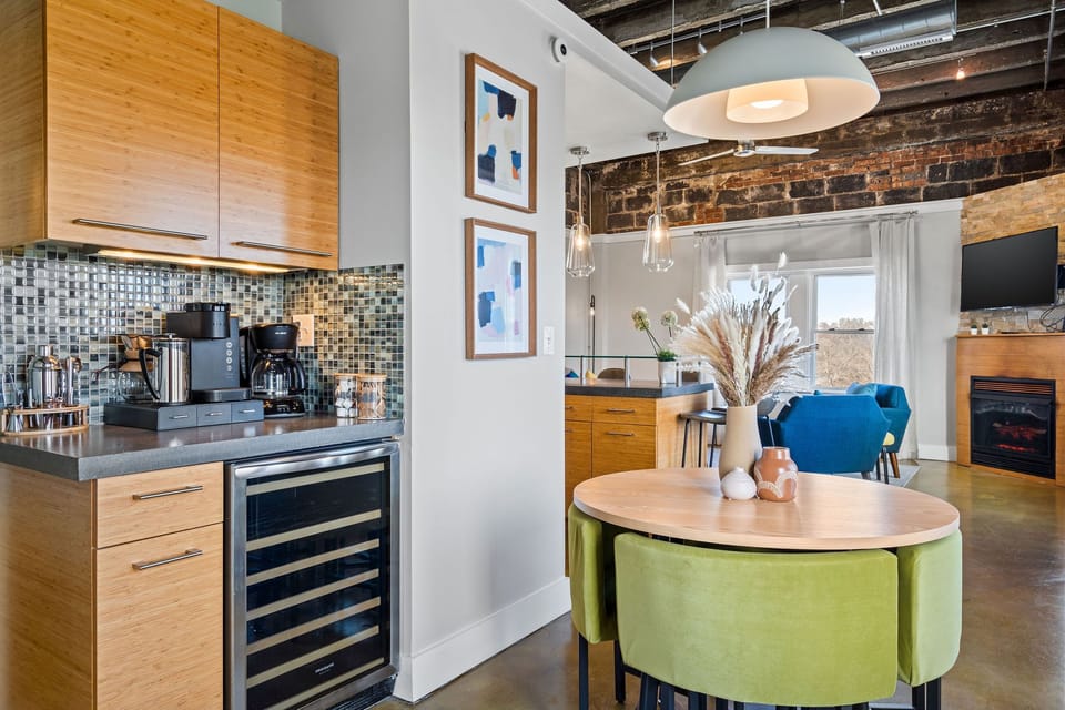 Conveniently located next to the kitchen, making serving and entertaining effortless in this open-concept penthouse.