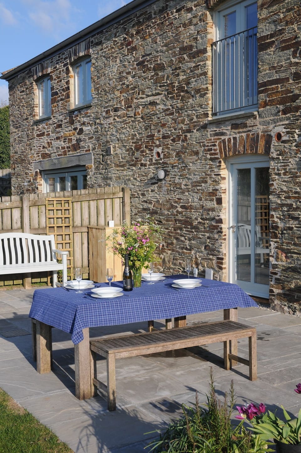 The rear garden is perfect for al fresco dining.