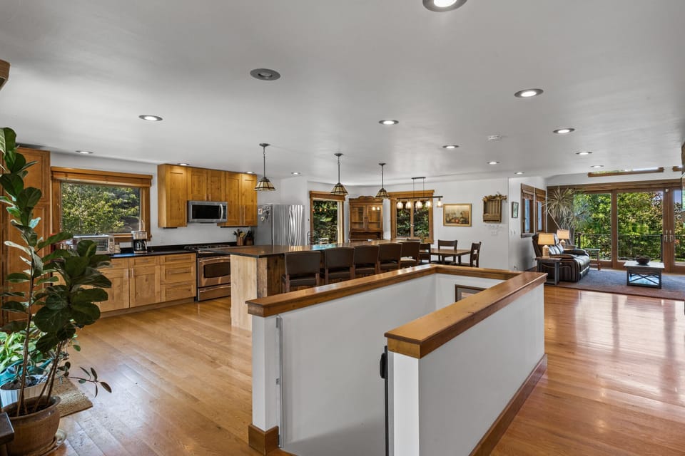 The kitchen and living room are right upon entering the home.