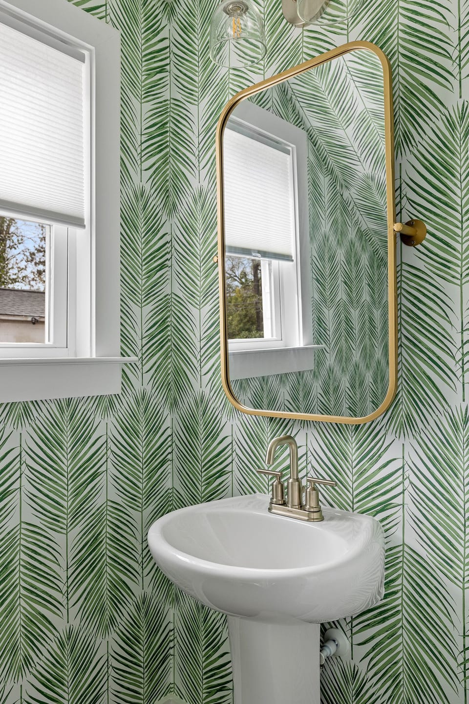 Take a trip to the tropics in the easily accessed powder room.