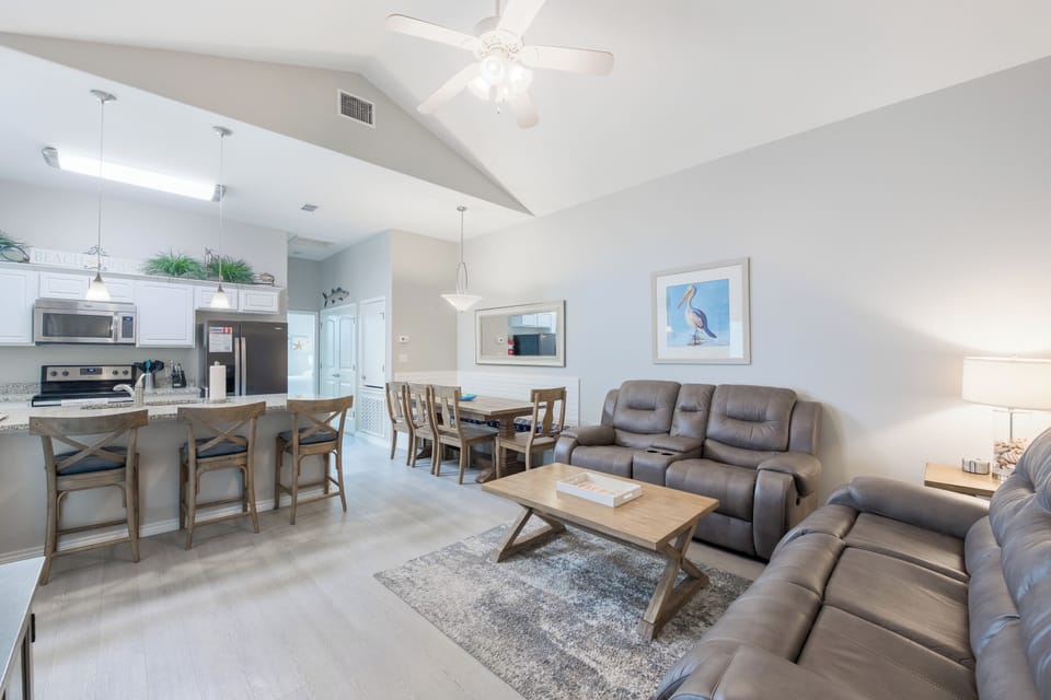 Cozy living area with flat screen TV to enjoy (seats do not recline)