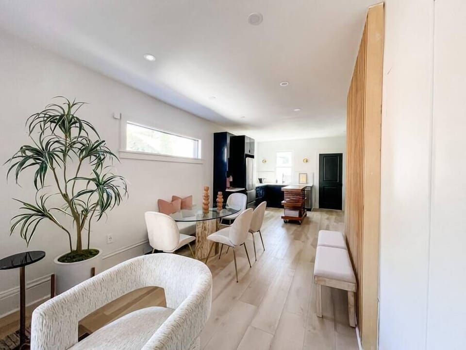 A view of the eat-in kitchen and dining room table. 