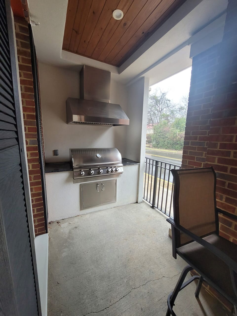 Patio Gas Grill with Utensils / coded gate to sidewalk / TV