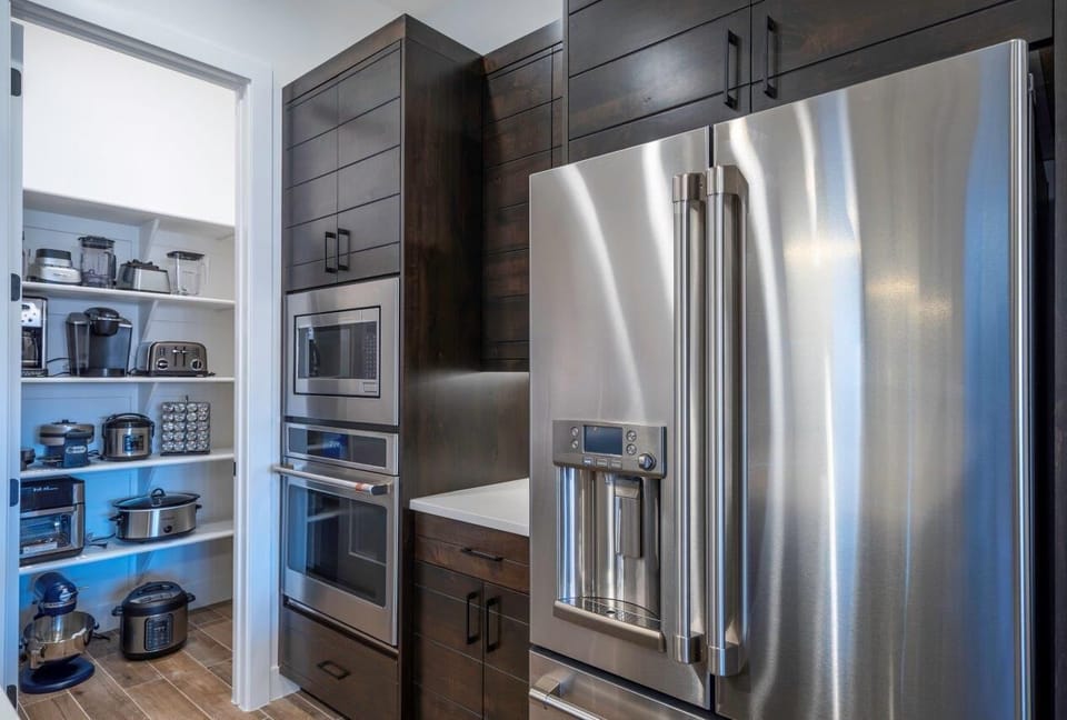 Ample kitchen supply provided with extra kitchen appliances - makes for easy cooking with large groups!